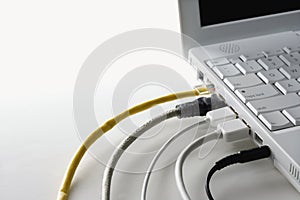 Cords Plugged Into Laptop Computer