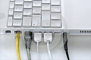 Cords Plugged Into Laptop Computer