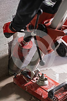 Core Drilling into Concrete Wall During Construction Work