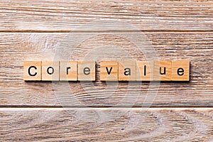 CORE VALUE word written on wood block. CORE VALUES text on wooden table for your desing, concept