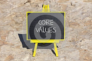 Core values symbol. Concept words Core values on black chalk blackboard on a beautiful stone background. Business value and core