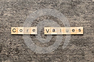 CORE VALUES word written on wood block. CORE VALUES text on cement table for your desing, concept