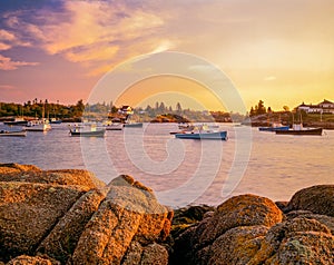 Corea Harbor glows at sunset in Maine , USA