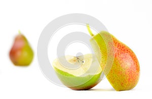 Corella pears on white backdrop