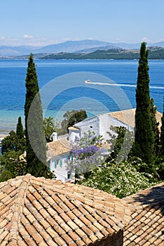 Corfu island, beautiful bay in Kalami village, Greece, Top view of picturesque mediterranean landscape.