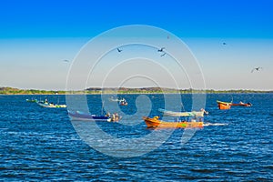 Corinto, Nicaragua - May 16, 2018: Outdoor view of fishing boats in the sea, during a gorgeous suny day in a blue sky