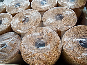 Cork backed rolls for floor laminates