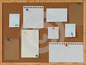 cork board with blank papers wooden frame. notes. colourful pin and paperclips . reminder. pin board. isolated. new year's