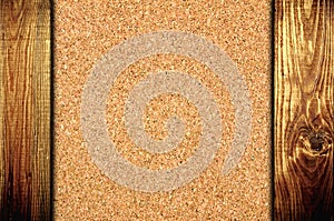 Cork board at wooden panel wall background