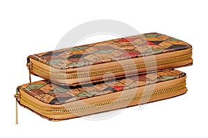 Cork fashion and lifestyle. Two fashionable colorful female luxury woman purses for money or wallets made from oak cork isolated