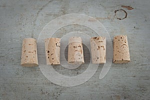 Cork stoppers on a wooden board