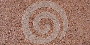 Brown cork wood background showing grain and mottled detail with copy space photo