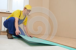 Cork worker at flooring work