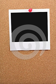 Corkboard and blank photo