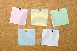 Corkboard with five blank notes