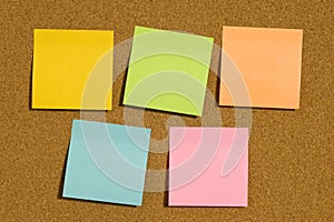 Corkboard With Five Blank Post-it Notes