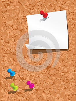 Corkboard with paper and pins