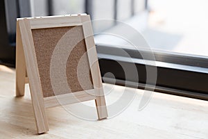 corkboard on a wooden table.