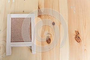 corkboard on a wooden table.