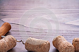 Corks of champagne very close up on vintage wooden