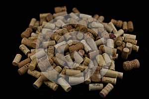 Corks from wine bottles empty wine bottle on black isolated back