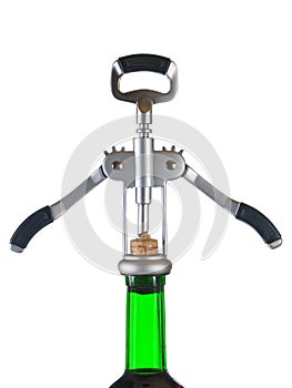 Corkscrew and bottle of wine