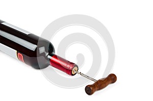 Corkscrew with a bottle of wine