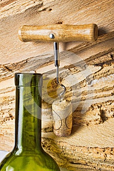 Corkscrew with a cork from a bottle