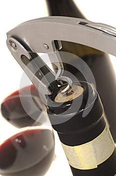 Corkscrew opening wine bottle