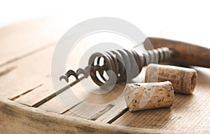 Corkscrew and two corks