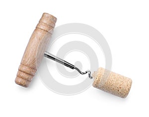 Corkscrew and wine bottle stopper isolated on white, top view