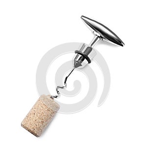 Corkscrew and wine bottle stopper isolated on white, top view