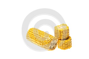 Corn on the cob cut into three parts isolated on white background