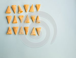 Corn cones pattern on green background