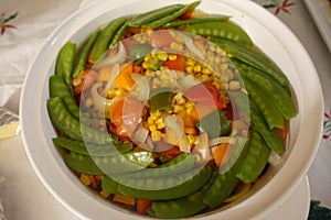 Corn dish with vegetables photo