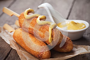 Corn dog with mustard