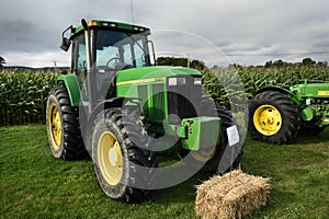 Corn field tractors at the farm