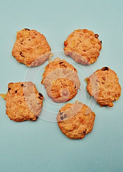 Corn flake cookies against a plain backlground