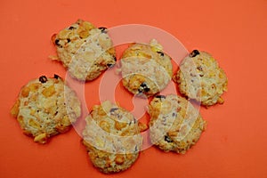 Corn flake cookies against a plain backlground