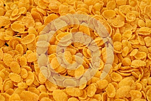 Corn flakes background and texture. Top view cornflake cereal box for breakfast