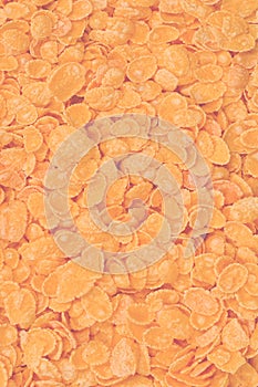 Corn-flakes background and texture. Top view. cornflake cereal box for morning breakfast