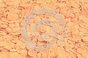 Corn-flakes background and texture. Top view. cornflake cereal box for morning breakfast