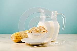 corn with flakes and milk/corn with flakes and milk on a blue background