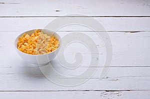 Corn flakes in a plate, healthy breakfast.