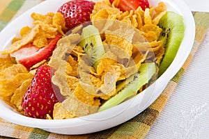 Corn Flakes with Strawberries and Kiwi Fruit