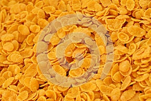 Corn flakes texture. Top view cornflake cereal box for morning breakfast