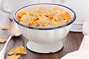 Corn flakes in white bowl