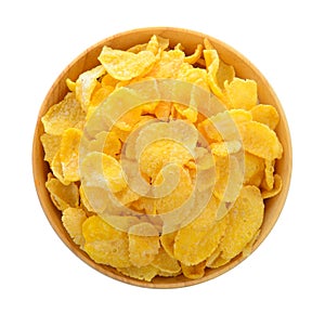 Corn flakes in wood bowl