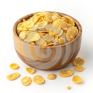 Corn flakes in wooden bowl isolated on white background photo