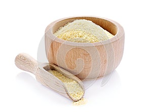 Corn grits in wooden bowl